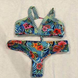 Luli Fama reversible bikini bright colors